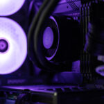 Close up of liquid cooler inside a computer case.